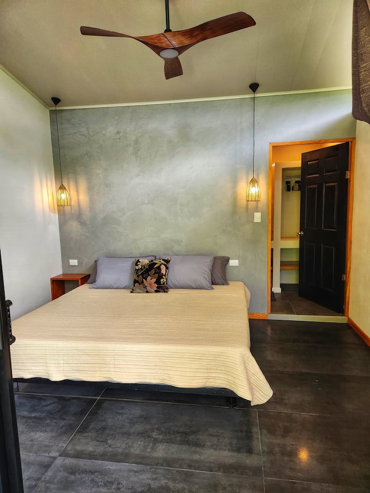 Inside the studio — the king bed