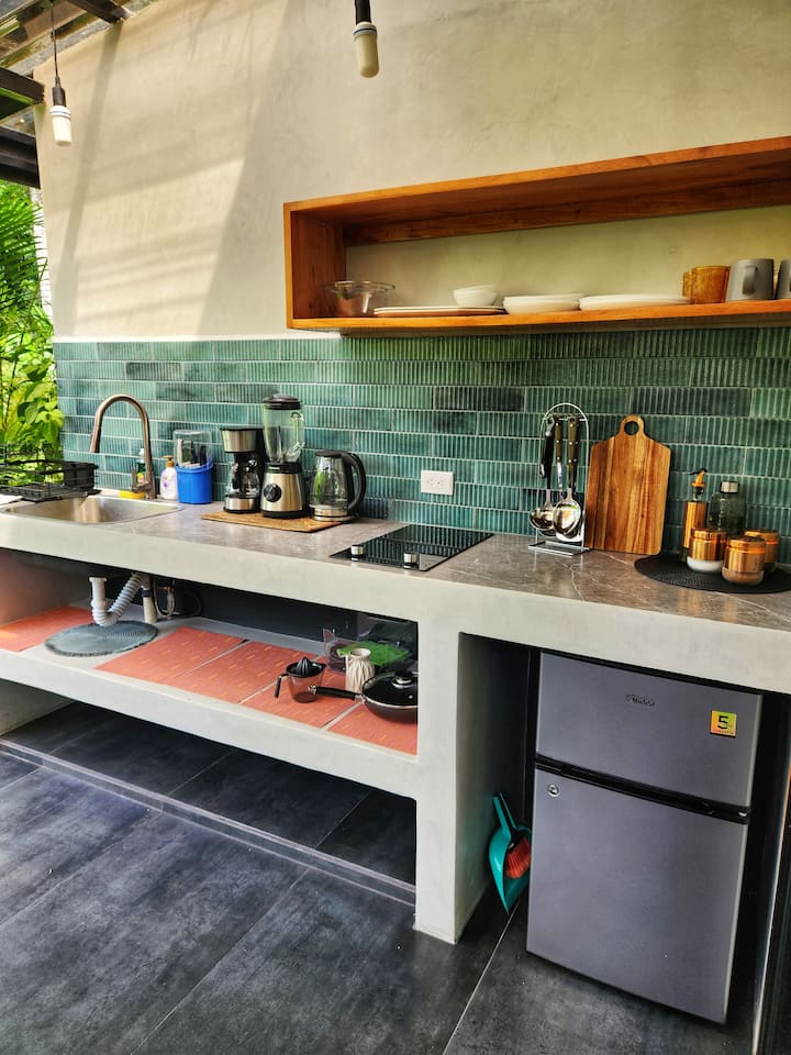 The private porch with the outdoor kitchen